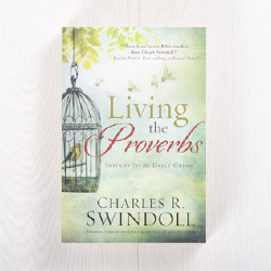Living the Proverbs: Insight for the Daily Grind, paperback by Charles R. Swindoll
